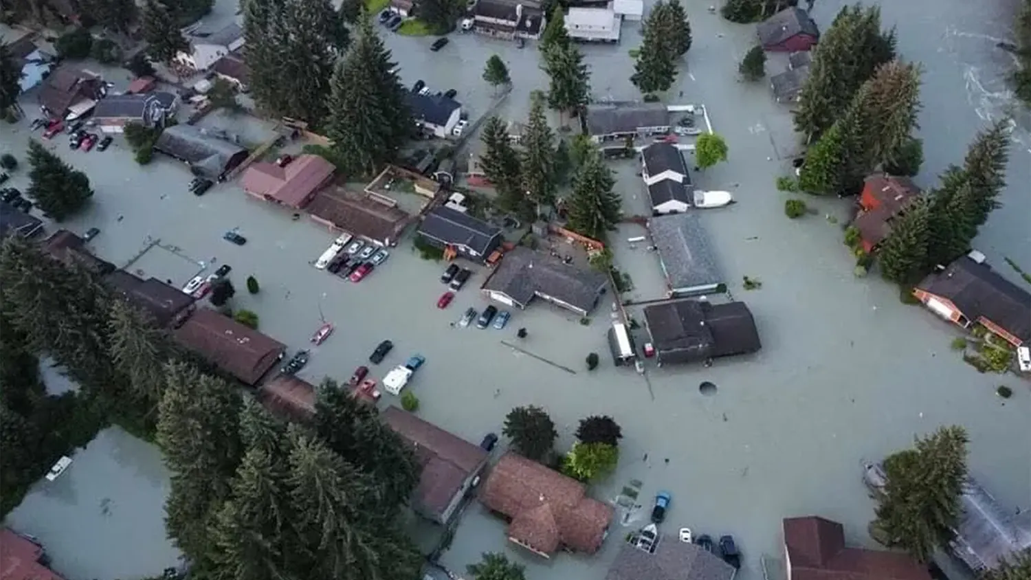 Aerial view of widespread flooding in a Juneau, Alaska neighborhood in August 2025 after a Mendenhall Glacier outburst flood.