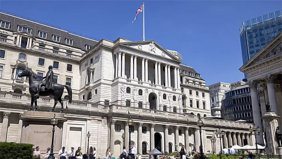 Exterior view of the historic neoclassical Bank of England building at Bank Junction in London, under a clear blue sky with pedestrians in the foreground