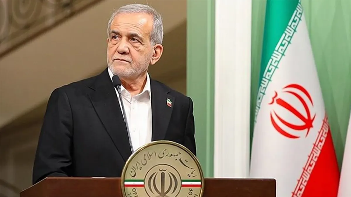 An Iranian official speaking at a podium bearing the seal of the Office of the President of Iran, standing in front of the Iranian flag.