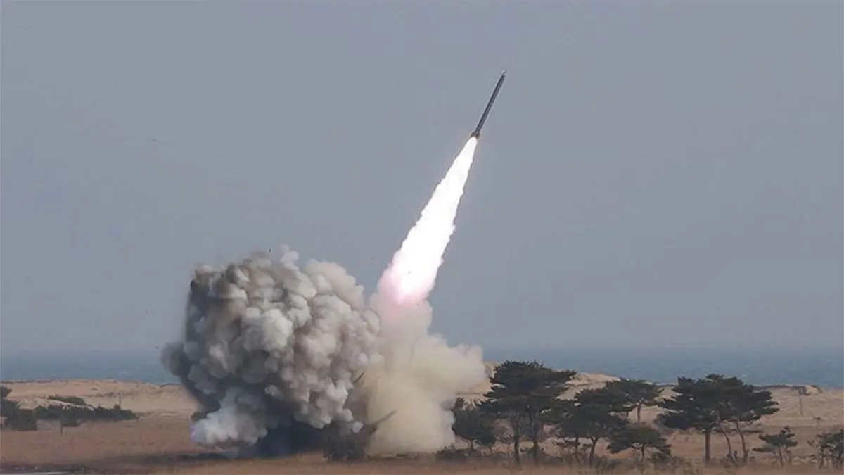 A long-range ballistic missile launching from a coastal area with a large plume of smoke, representing the escalation between Israel and Houthi forces in Yemen during September 2025