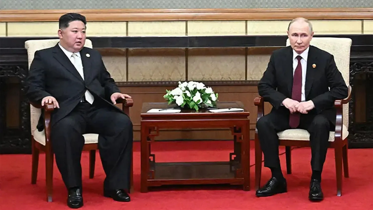 Putin and Kim Strengthen Alliance in Beijing, Pledge Deepened Military Support Against Ukraine