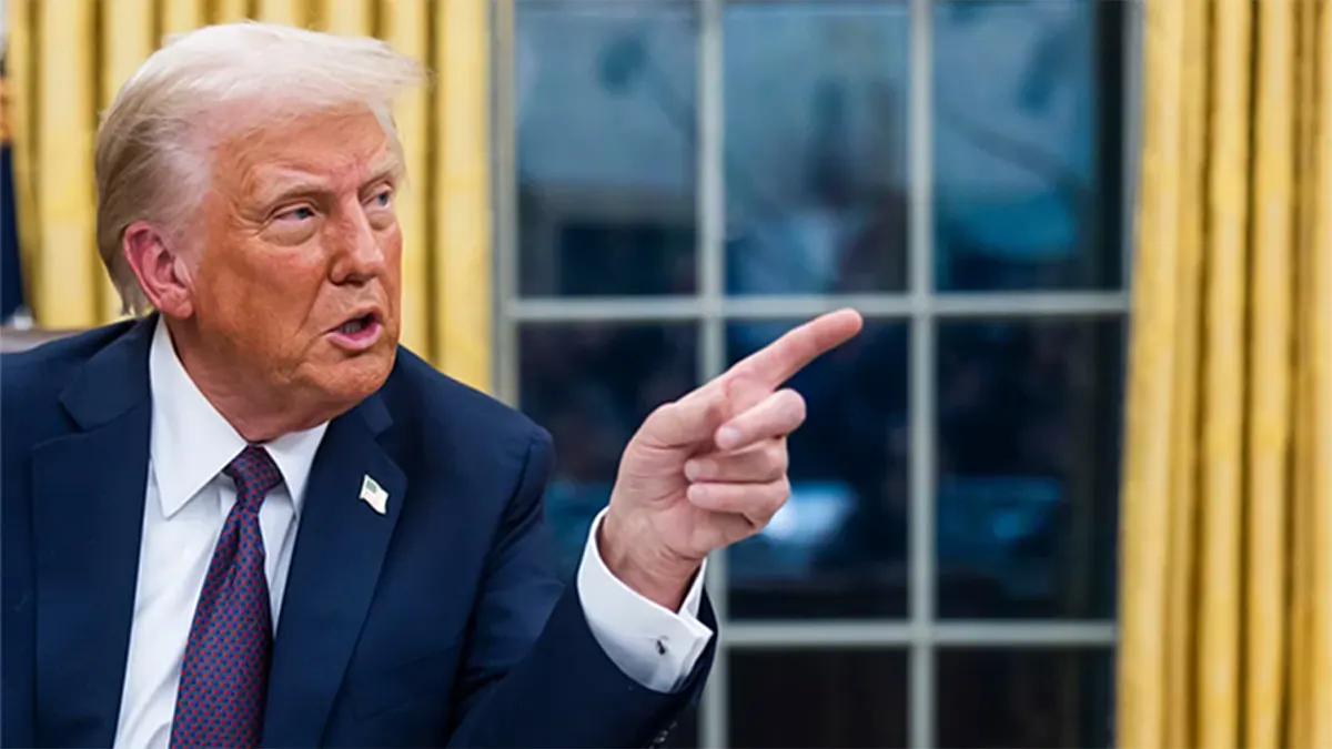 President Donald Trump speaking and gesturing in the Oval Office, announcing sweeping new U.S. tariffs on imported heavy trucks, patented pharmaceuticals, and furniture.