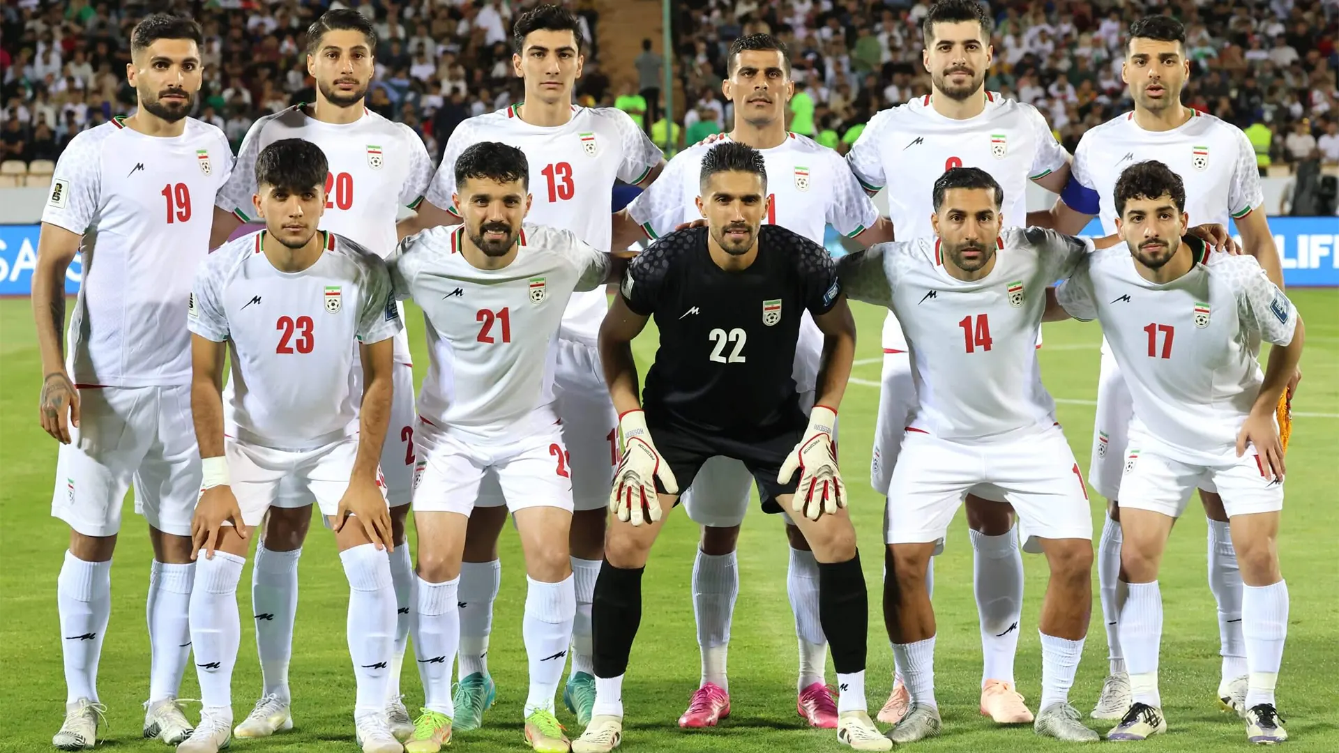 The Iran national football team posing for an official group photo ahead of the 2026 World Cup amidst reports of the federation's withdrawal from the tournament
