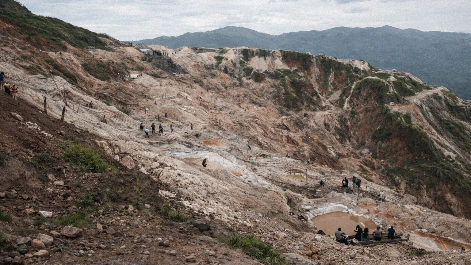Artisanal miners working on the steep slopes of the Rubaya coltan mine in North Kivu, Democratic Republic of Congo, where a deadly landslide killed over 200 people
