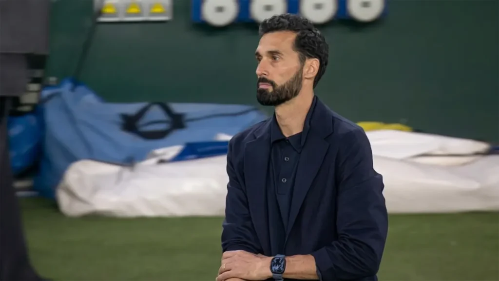 Professional high-resolution portrait of Real Madrid manager Álvaro Arbeloa standing on the touchline during the La Liga match against Real Betis at the Benito Villamarín Stadium.