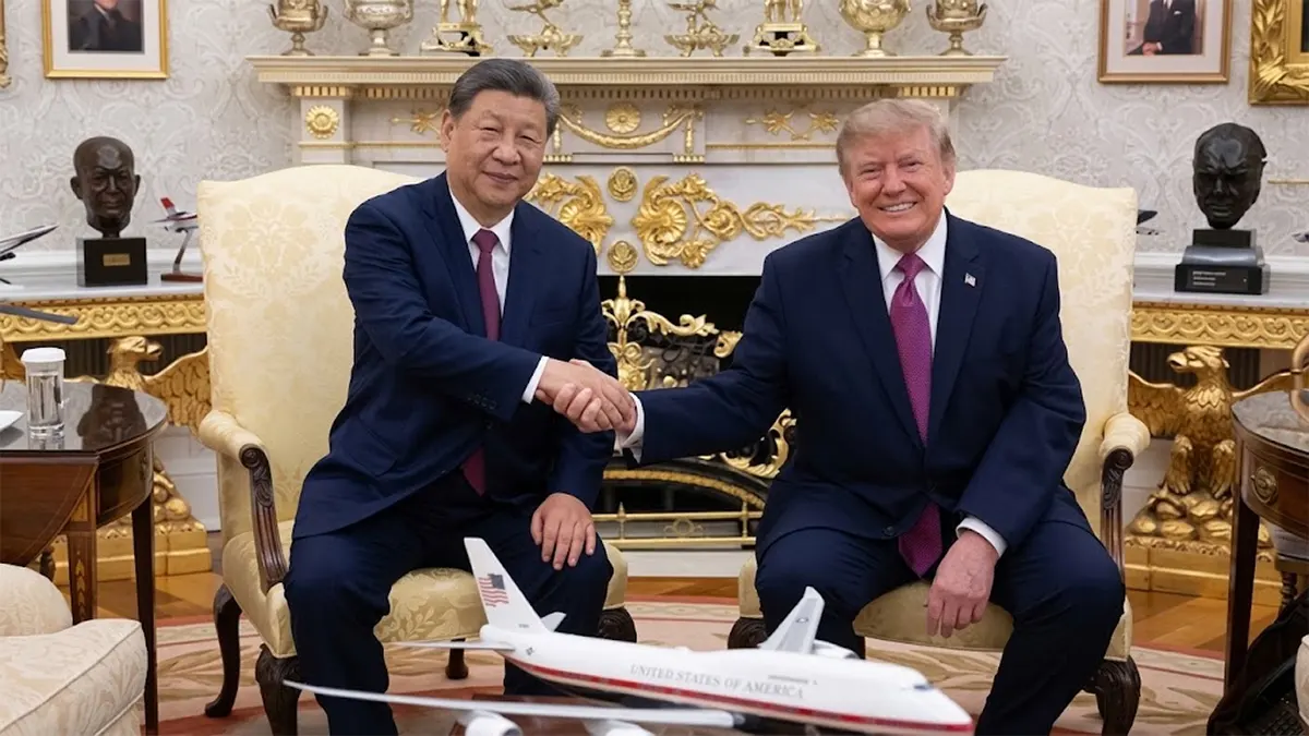 US President Donald Trump and Chinese President Xi Jinping shaking hands in the Oval Office during the U.S.–China summit.